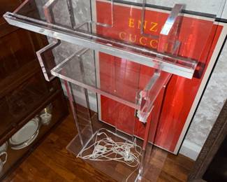 Lucite or acrylic floor standing podium with shelf, some wear but overall excellent shape