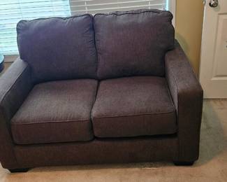Chocolate Brown loveseat/ pullout like new