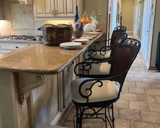 Three iron bar stools