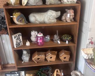 Birdhouses, vintage cast concrete reclining pig