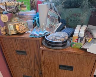 2 File Cabinets  - Cleaning Supplies 
