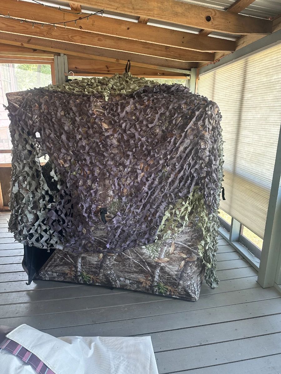 Large camouflage tent , drop down screens on all sides