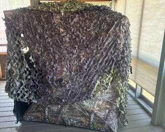 Large camouflage tent , drop down screens on all sides