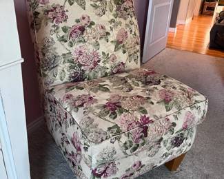 Set of two floral accent chairs.