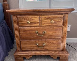 Hard Wood 3 drawer night stand with secret compartment.