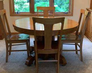 48" round oak pedestal table w/ 6 solid oak chairs & four 11.5" leaves
