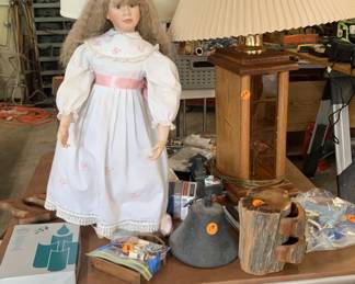 Porcelain hand painted doll & stand