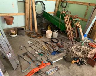 Vintage wood sleds, outdoor tools, power chords, metal lawn cart