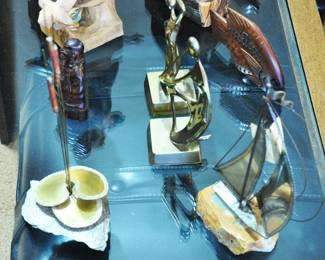 2 Brutalist pieces and contempoprary brass dancers