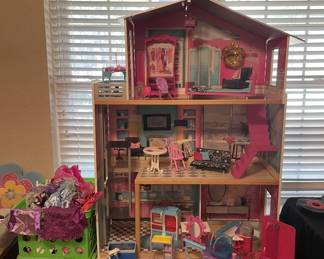 Barbie clothes & contents sold separately from House