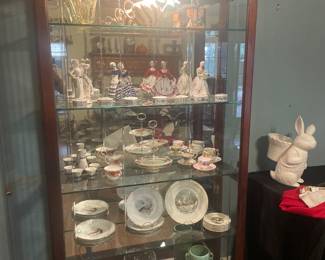 Beautiful lighted Display Cabinet.  At least 6' tall.  Doors open on both sides.