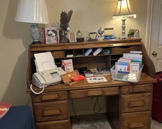 Roll Top desk not included in Sale , fax machine, books, photo paper, lamps, eagle, misc