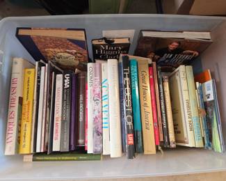 Many books that include reference books for Royal Doulton, Rookwood pottery, dolls, and every other collectible in the home.