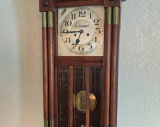 C. Coppel walnut wall clock