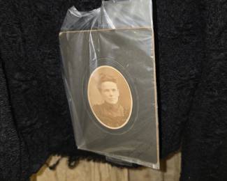 Antique Findley Onyx glass that was saved from the warehouse fire in 1891. The dress in the next photo was worn by the lady that was able to save these pieces. The dress has a photo of the lady attached