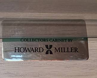 One, of several, Howard Miller collectibles cases