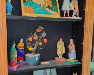 Beatrix Potter figurines and antique tiles