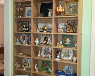 Beatrix Potter figurines and antique tiles