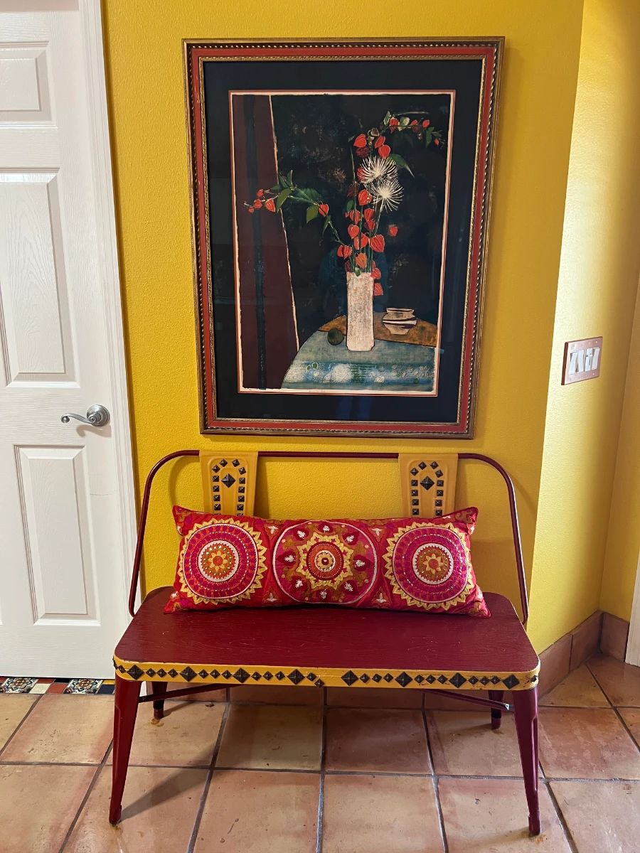 Painted metal Mexican bench, colorful poppy art.