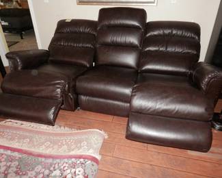 3 seat against the wall motorized leather recliner.....open