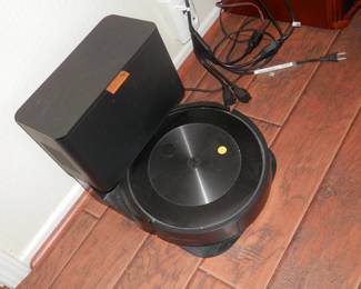 Just what everyone should have ....ROOMBA robot vaccuum