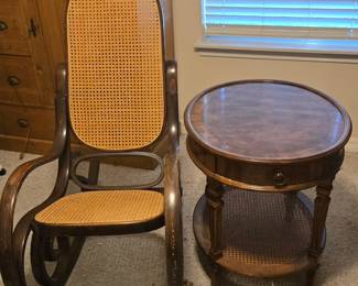 This bentwood cane rocking chair features graceful curved lines and a woven cane seat and back in solid, original condition. Vintage rocking chairs with intact cane work are increasingly sought after for farmhouse and cottage interiors where antique furniture adds warmth and character. A beautiful piece for a porch, reading nook, or anyone collecting classic American bentwood furniture.