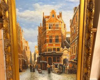 This old world street scene painting is rendered in rich detail and set in an ornate gilt frame that enhances its continental character. European cityscape paintings in antique frames like this are a natural fit for traditional interiors and collectors of vintage European wall art. A striking conversation piece for anyone drawn to gilt framed paintings with old master-inspired atmosphere.