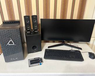 This lot pairs an LG ultrawide monitor on its V-stand with a Gamdias Ares P2 keyboard, a matching gaming mouse, and a Gigaware 2.1 speaker set with subwoofer. Also included is a sealed Patriot Viper DDR4 memory kit labeled 64GB (2 x 32GB) at 3200 MT/s, marked Intel XMP 2.0 ready and listed as compatible with Intel Core and AMD Ryzen series CPUs. A strong bundle for anyone building or upgrading a desktop setup.