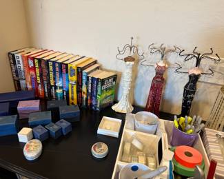 Jewelry dolls, books, glass etchingt thingys that you put a light under, don't know what they are called.