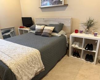 Queen bed, white side tables/book cases