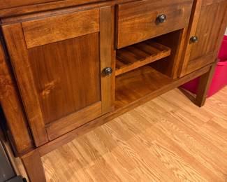 Wood buffet/sideboard with cabinets, drawer, and wine storage