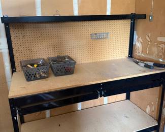 Garage workbench with pegboard, drawers and lower shelf