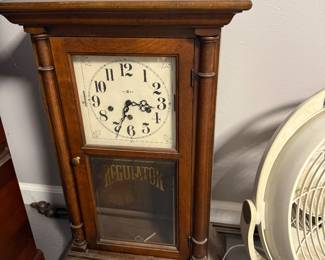 Howard Miller-style regulator wall clock