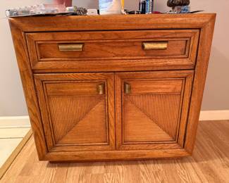 Vintage wood storage cabinet with drawer and doors