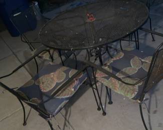 Vintage wrought-iron patio table and chair set
