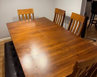 Extendable Wood dining table with chairs and bench seating