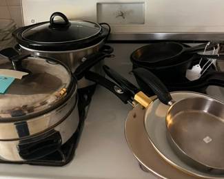 61. Kitchen: Coseup of Pots and Pans