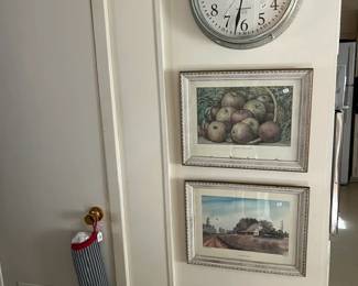 50. Prints & Clock in Kitchen