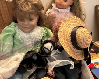 Multiple Dolls, some souvenir dolls