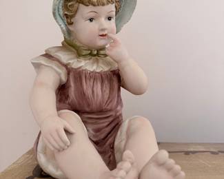 Antique Bisque Porcelain Piano Baby Figurine