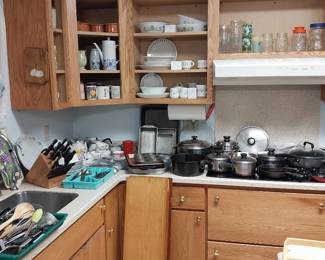 Sunbeam stand mixer, Hamilton beach toaster, Osterizer blender, Black and Decker coffee maker, Keurig, bake ware, crock pots, electric fry pans, Nu Wave infrared oven, Mr Coffee dehydrator, Cutco knife set with block, Glasbake green daisy, Corelle service for 14, Homer Laughlin festival service for 4, Queen by Amway pots and pans