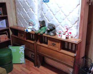 twin beds, vinyl ottomans