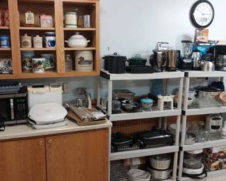 Sunbeam stand mixer, Hamilton beach toaster, Osterizer blender, Black and Decker coffee maker, Keurig, bake ware, crock pots, electric fry pans, Nu Wave infrared oven, Mr Coffee dehydrator, Cutco knife set with block, Glasbake green daisy, Corelle service for 14, Homer Laughlin festival service for 4, Queen by Amway pots and pans, Pyrex, Tupperware, bread maker