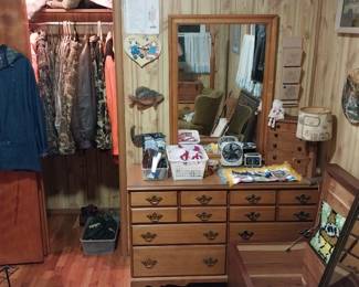 dressers, men's coats, table lamp