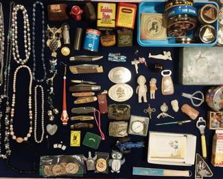 jewelry, pocket knives, shoe polish, tins, marbles, belt buckles, wooden nickels