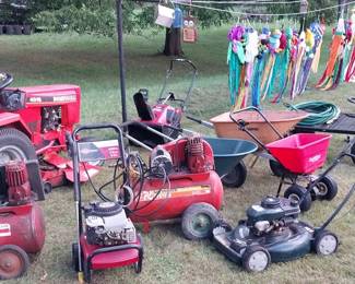 Ingersoll 4016 lawn tractor, Simplicity rototiller, lawn spreader, Toro snow blower, Craftsman push mower, utility flatbed utility cart, Briggs and Stratton pressure washer, Sears air compressor, Montgomery Ward air compressor, wind socks