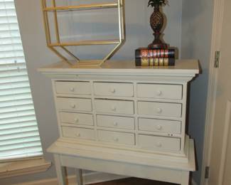 Solid wood cabinet on wood table