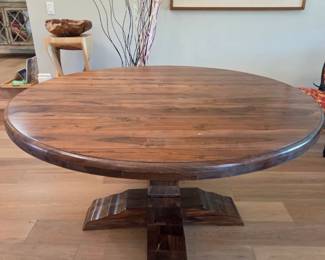 Large Round Pedestal Dining Table LARGE ROUND PEDESTAL DINING TABLE — PRE-SALE $1,050 Beautiful large round wood dining table with prominent grain, warm walnut-tone finish and a substantial architectural pedestal base. Excellent statement dining table for a large dining area. Send us a message through EstateSales.NET with “Round Dining Table” for availability, measurements, or private preview.