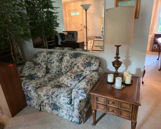 Floral loveseat and end table