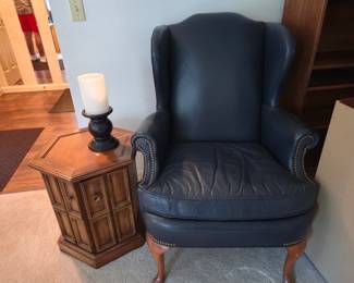 Blue leather wing chair, end table
